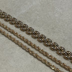 A close-up of the panther bracelet, near to the rope chain