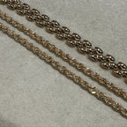 Macro shoot of the rope chain, near a panther link bracelet